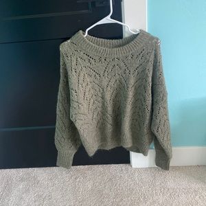 green sweater